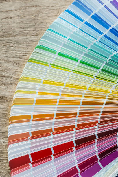 istock Multicolored pantone fan on wooden meter 936532614