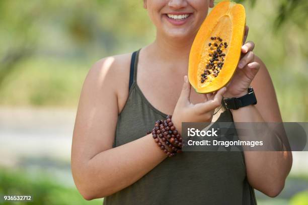 Posing For Photography With Papaya Stock Photo - Download Image Now - Adult, Adults Only, City