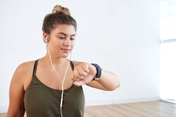 istock Sporty Woman Checking Heart Rate 936532740