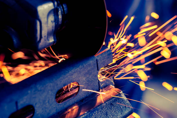 istock Metal being cut with electric grinder with sparks flying 936542960