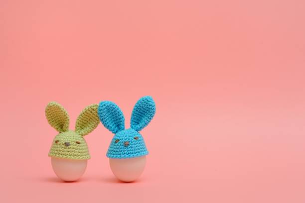 istock Easter holiday concept with handmade eggs, bunny, chicks on on a pink  background. Easter ideas 936543976