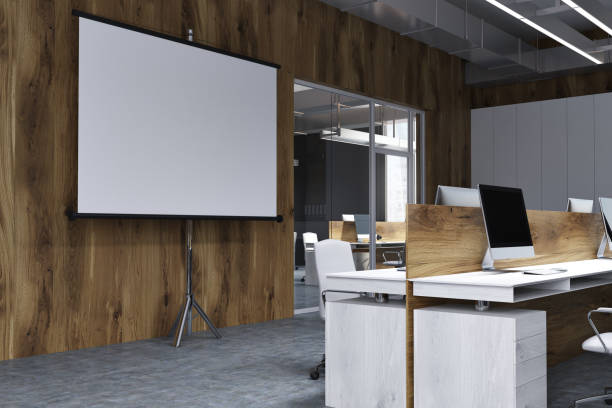 istock White screen in a wooden office corner 936548082