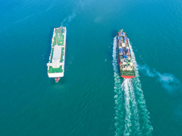 istock Container ship in export and import business and logistics. Shipping cargo to harbor by crane. Water transport International. Aerial view 936548264
