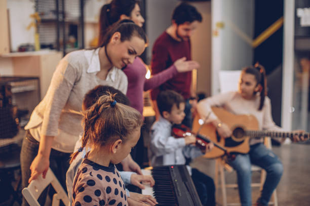 istock Class in music school for kids 936551366