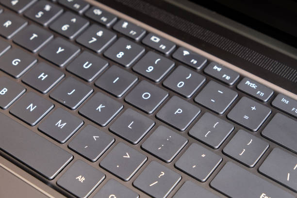 istock Part of opened laptop keyboard top view closeup 936551986