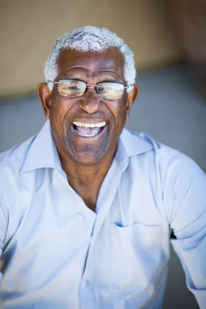 istock Senior African American Man Headshot Portrait 936552452