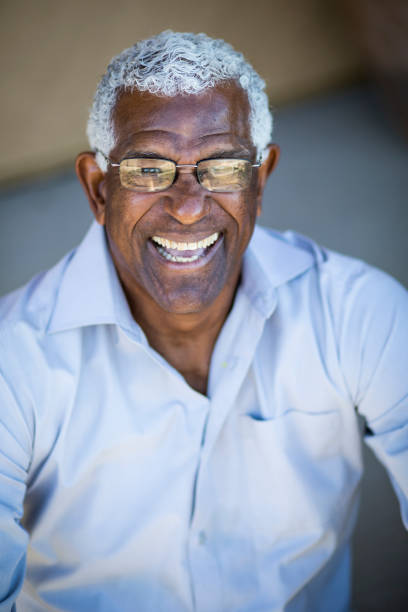 istock Senior African American Man Headshot Portrait 936552530