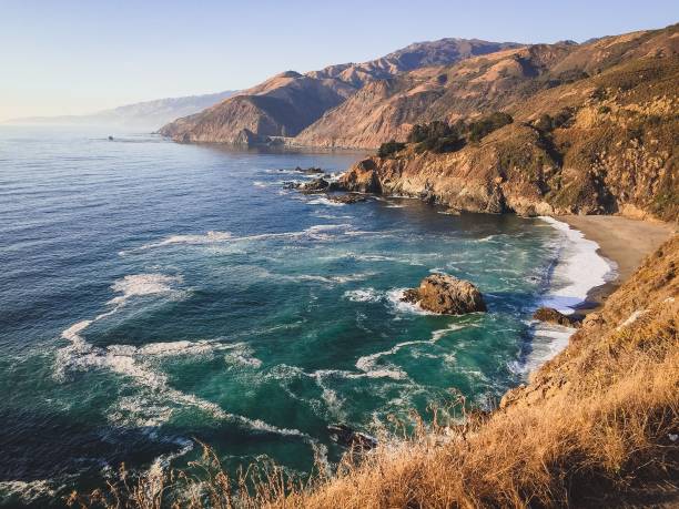 istock blue water on golden california coast 936558442