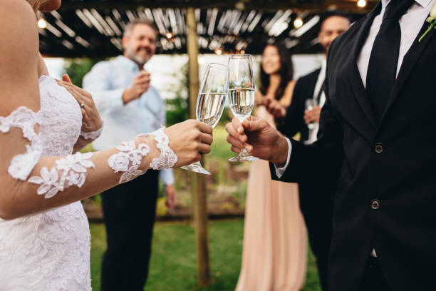 istock Wedding toast by newlywed couple 936559720