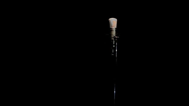 Microphone singer on a black background