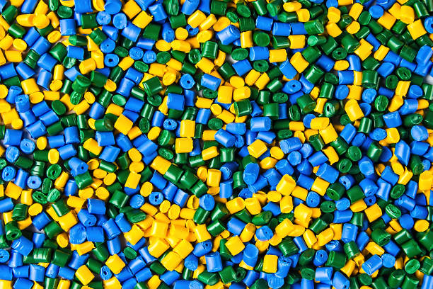istock Polymeric dye. Plastic pellets. Pigment in the granules. Polymer beads 936560284