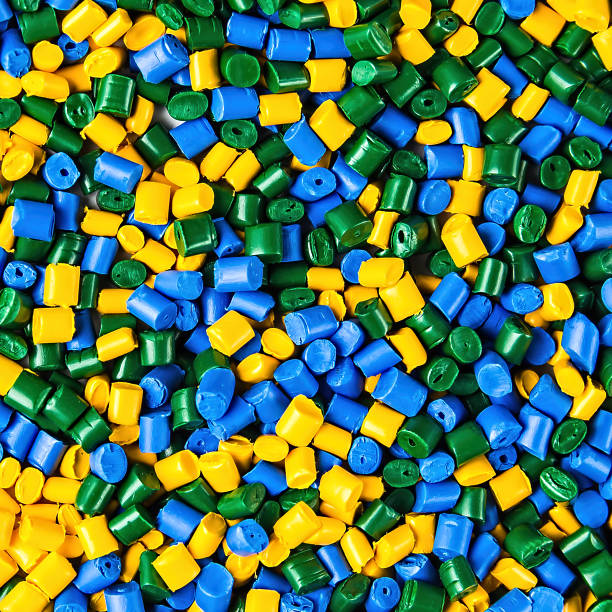 istock Polymeric dye. Plastic pellets. Pigment in the granules. Polymer beads 936560290
