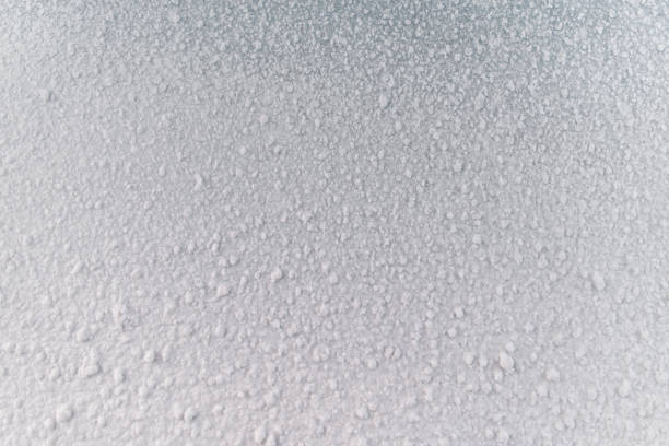 istock white snow texture. design resources. frozen ice covered with snow 936567670