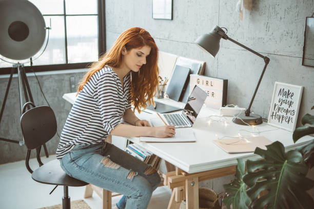 istock She's got her own cosy office setup at home 936569506