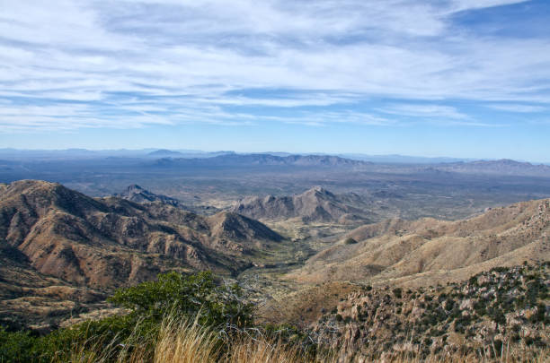 Quinlan Mountains and Sonoran Desert The Quinlan Mountains and Sonoran Desert as viewed from Kitt Peak National Observatory.  Kitt Peak is an astronomical observatory in the Sonoran Desert of Arizona on the Tohono O'odham Indian Reservation.  It has 23 obtical and 2 radio telescopes, making it the largest of observatory in the Northern Hemisphere. tohono o'odham stock pictures, royalty-free photos & images