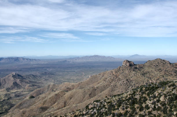 Quinlan Mountains and Sonoran Desert The Quinlan Mountains and Sonoran Desert as viewed from Kitt Peak National Observatory.  Kitt Peak is an astronomical observatory in the Sonoran Desert of Arizona on the Tohono O'odham Indian Reservation.  It has 23 obtical and 2 radio telescopes, making it the largest of observatory in the Northern Hemisphere. tohono o'odham stock pictures, royalty-free photos & images