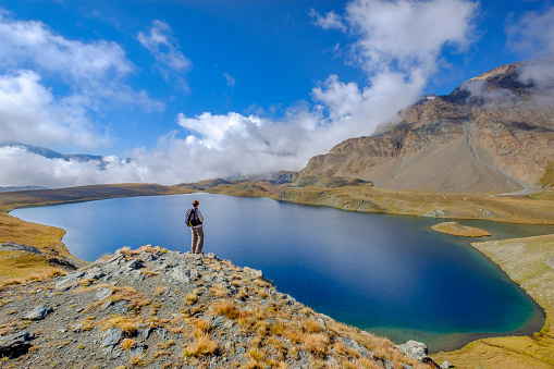 Andean landscapes on the slopes of the Los Ilinizas volcano, reflections in the Los Patos lagoon