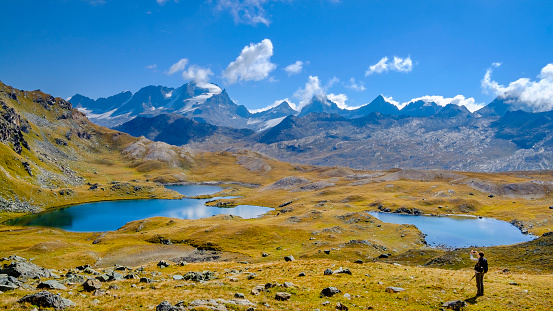 Mountain lakes on the footpath starting from the Nivolet Pass (Italian: Colle del Nivolet), a mountain pass located in the Gran Paradiso National Park. Valle d’Aosta, Italy