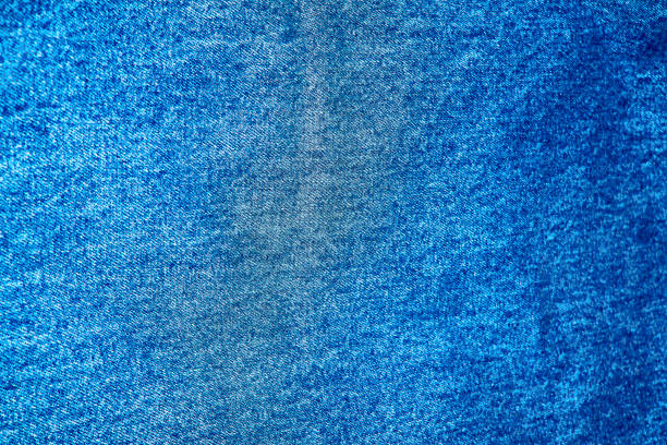 istock Texture of denim fabric close-up 936573610