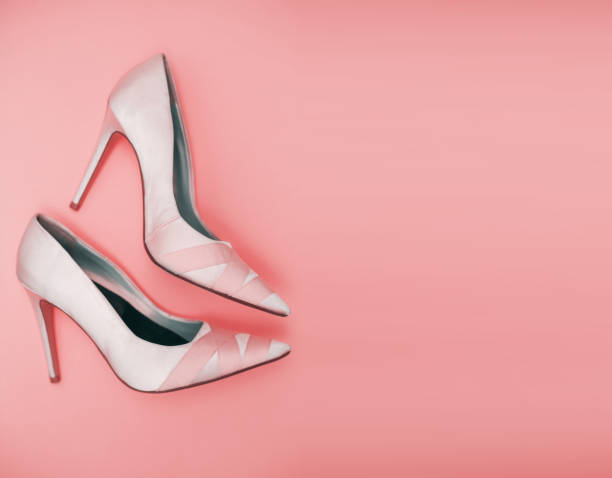 istock Pink High Heels on pink background 936582588