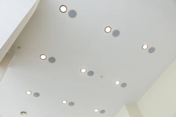 istock Modern multi-layered ceiling with a large number of built-in lamps 936583390