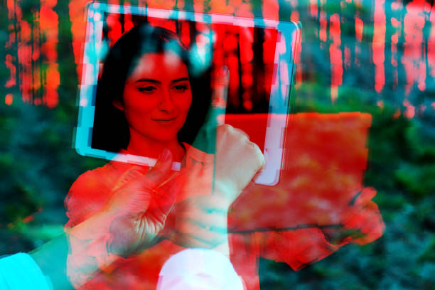 Young attractive woman doing a self-portrait with her digital tablet