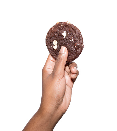 African ethnicity holding cookie