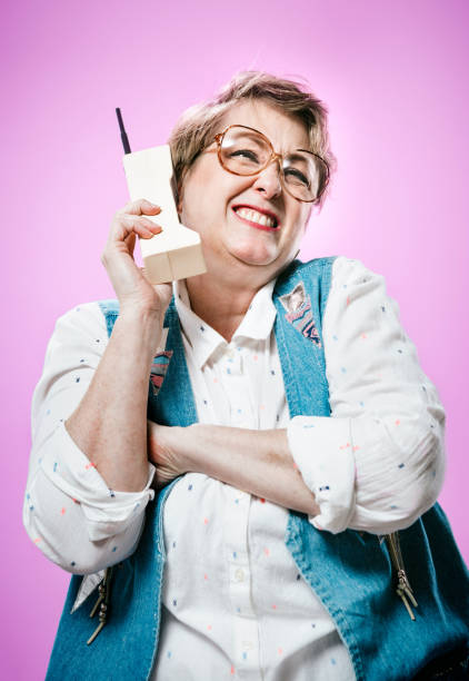 Nineties Styled Woman Talking on Mobile Brick Phone