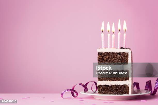 Chocolate Birthday Cake With Pink Candles Stock Photo - Download Image Now - Birthday, Cake, Slice of Food