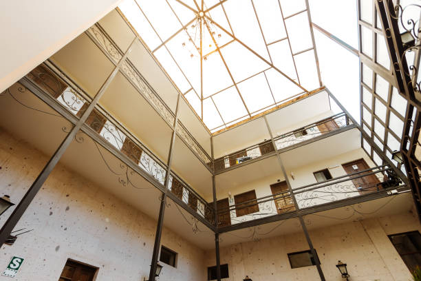 istock Skylight with chandelier hanging in the central hall of a Peruvian building 936597700