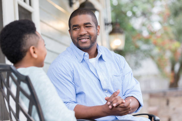 istock Dad gives young son advice 936598624