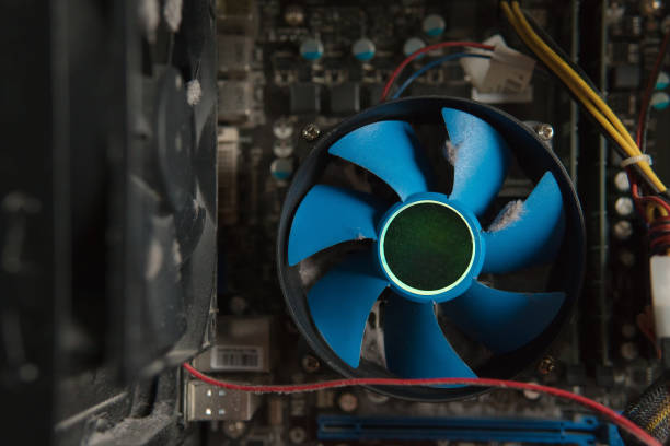 istock Dusty computer cooler with fan full of dust, macro 936607360