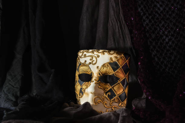 istock Mask of the Venetian carnival on a dark blured background 936610930