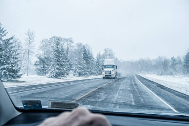 Winter Blizzard Snow Storm Approaching Semi Tractor Trailer Truck