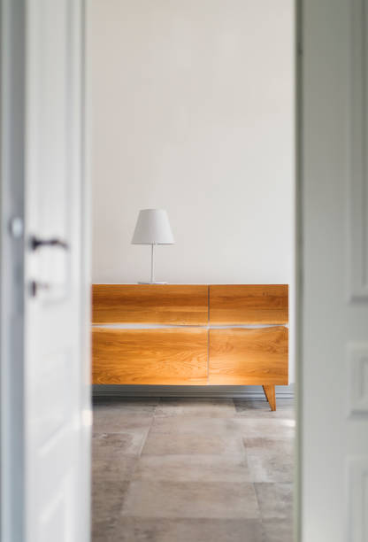 istock Lamp on a dresser 936611516