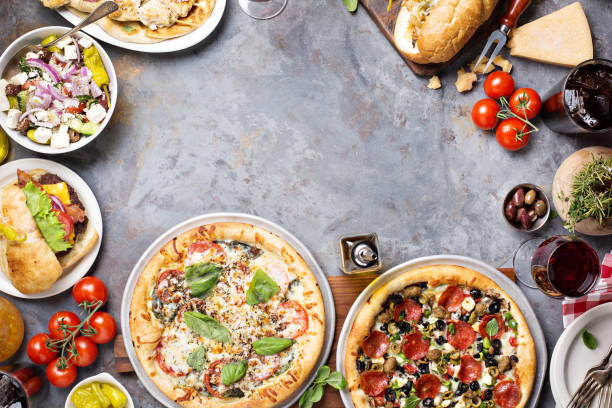 istock Margherita and pepperoni pizza with basil 936615164