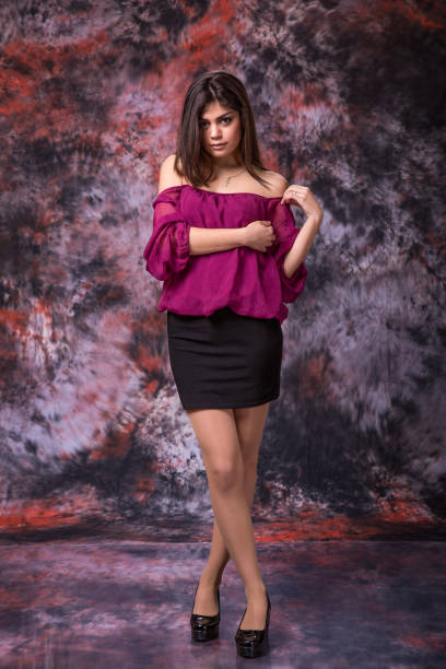 Young woman holding arms crossed