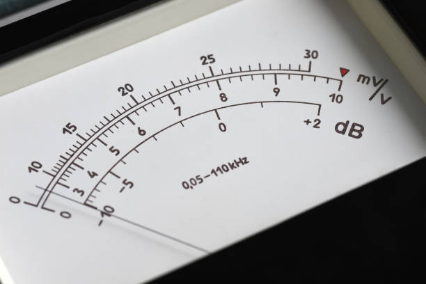 The scoreboard and the toggle switch of an analog point meter measuring power and voltage