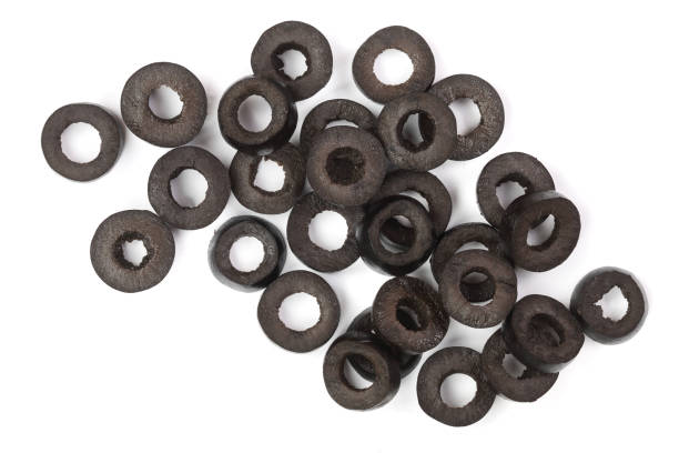 istock sliced black olives isolated on white background. Top view. Flat lay pattern 936622060