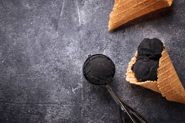istock Black ice cream. Trendy food 936622144