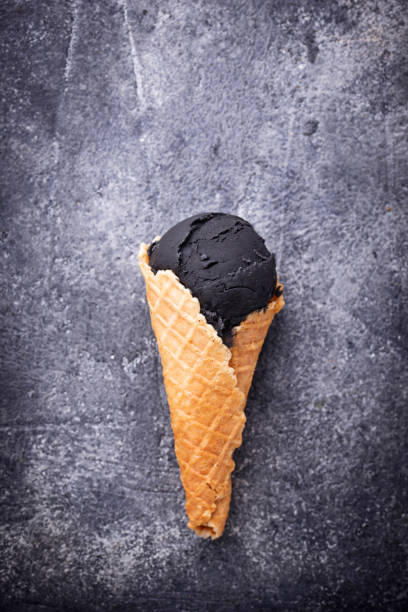istock Black ice cream. Trendy food 936622320