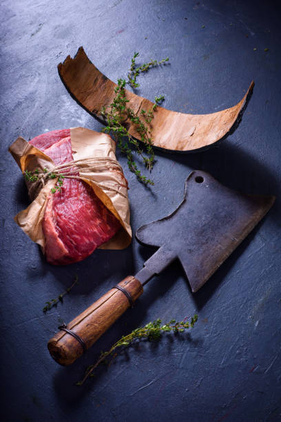 istock Raw meat, beef steak, cooking ingredients, spices. 936625058
