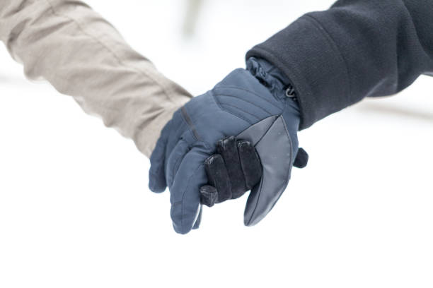 istock a girl is holding a male hand 936635408