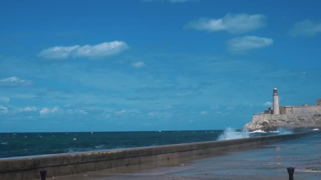 Sea crashing against the rocks alongside the Malecon, Havana, Cuba