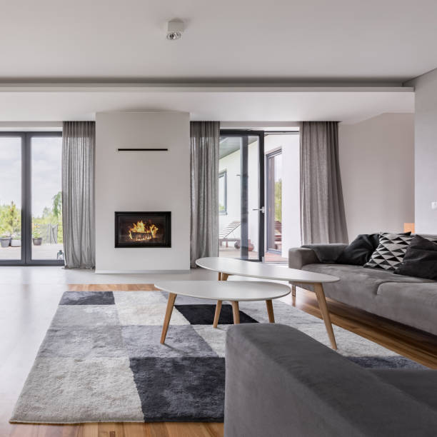 istock Elegant living room with fireplace 936639472