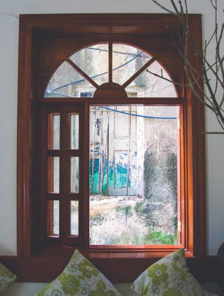 istock vintage window shades through an open window 936642466