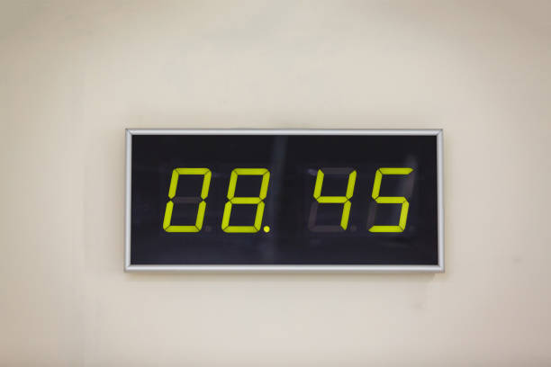 istock Black digital clock on a white background showing time 8 hours 45 minutes 936646488