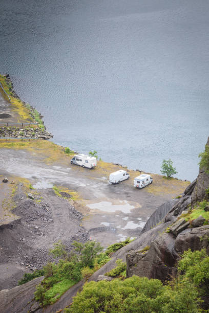 istock Camper cars on norwegian fjord 936653336