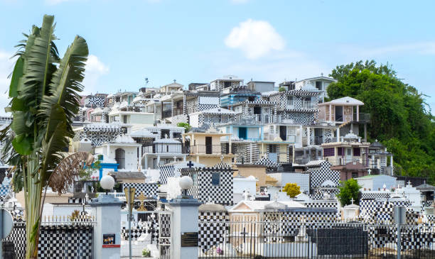 Cemetery of Morne-a-l'eau, Basse-Terre, Guadeloupe, with typical black and white graves all over the hill