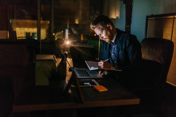 istock Businessman working late night in the office 936659134
